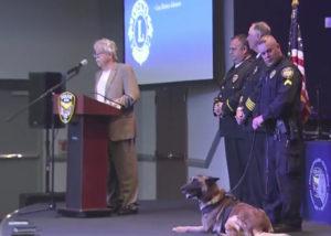 Lion Horace Johnson presenting to the Apex Police Department