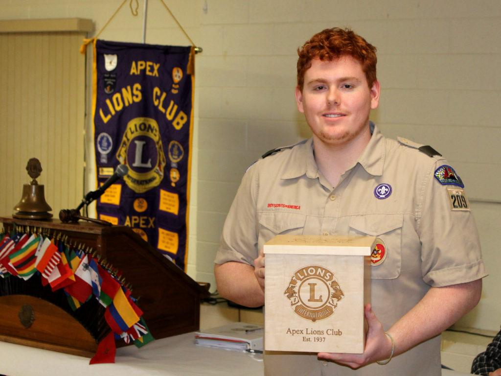 Scout holding box