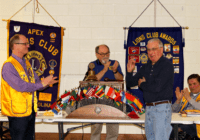 Lion John Lynde and PDG Gene English applaud new member Lion Tony Formichelli